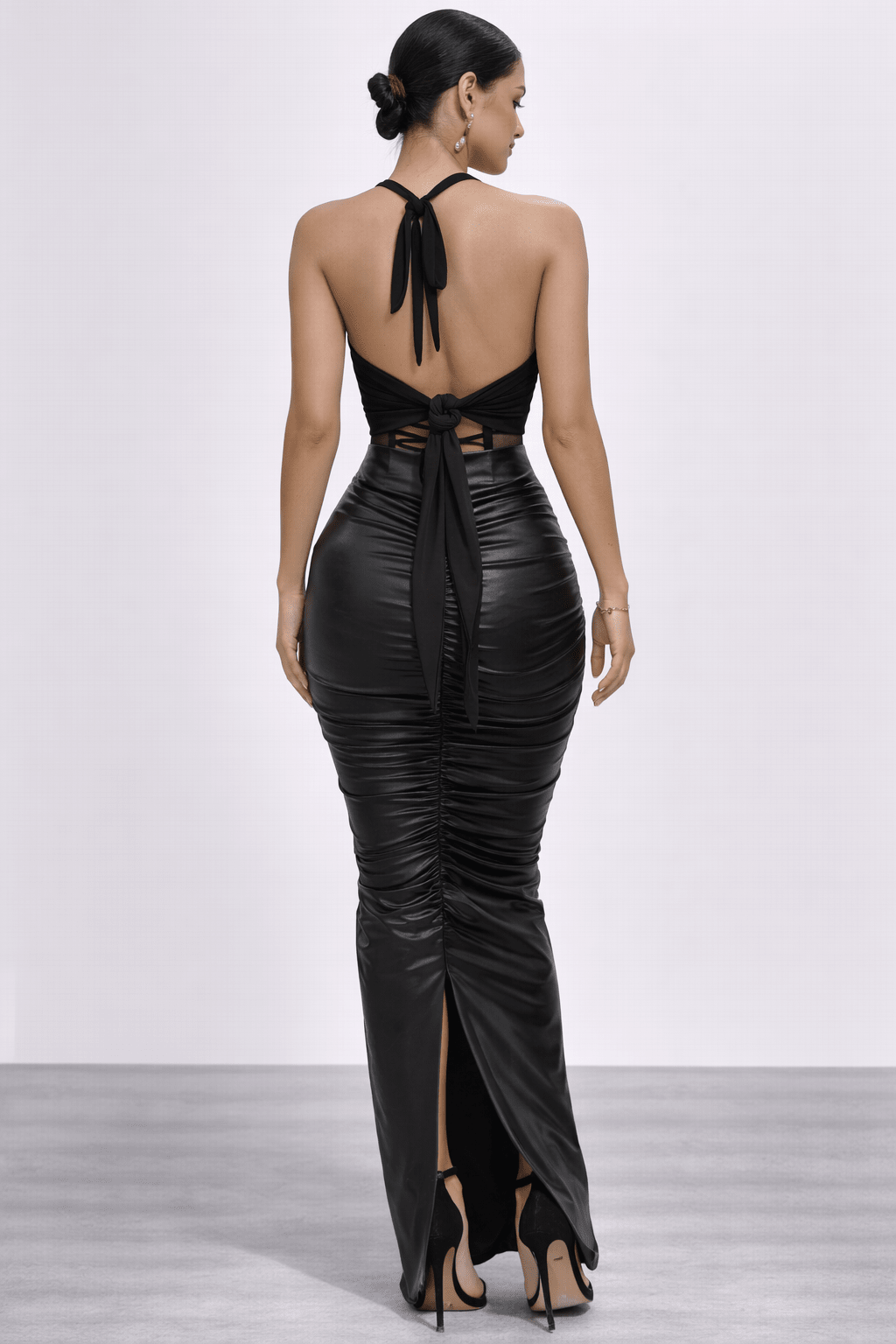 Back view highlighting tie-back sash and open halter. Eve Top - Vie Sauvage