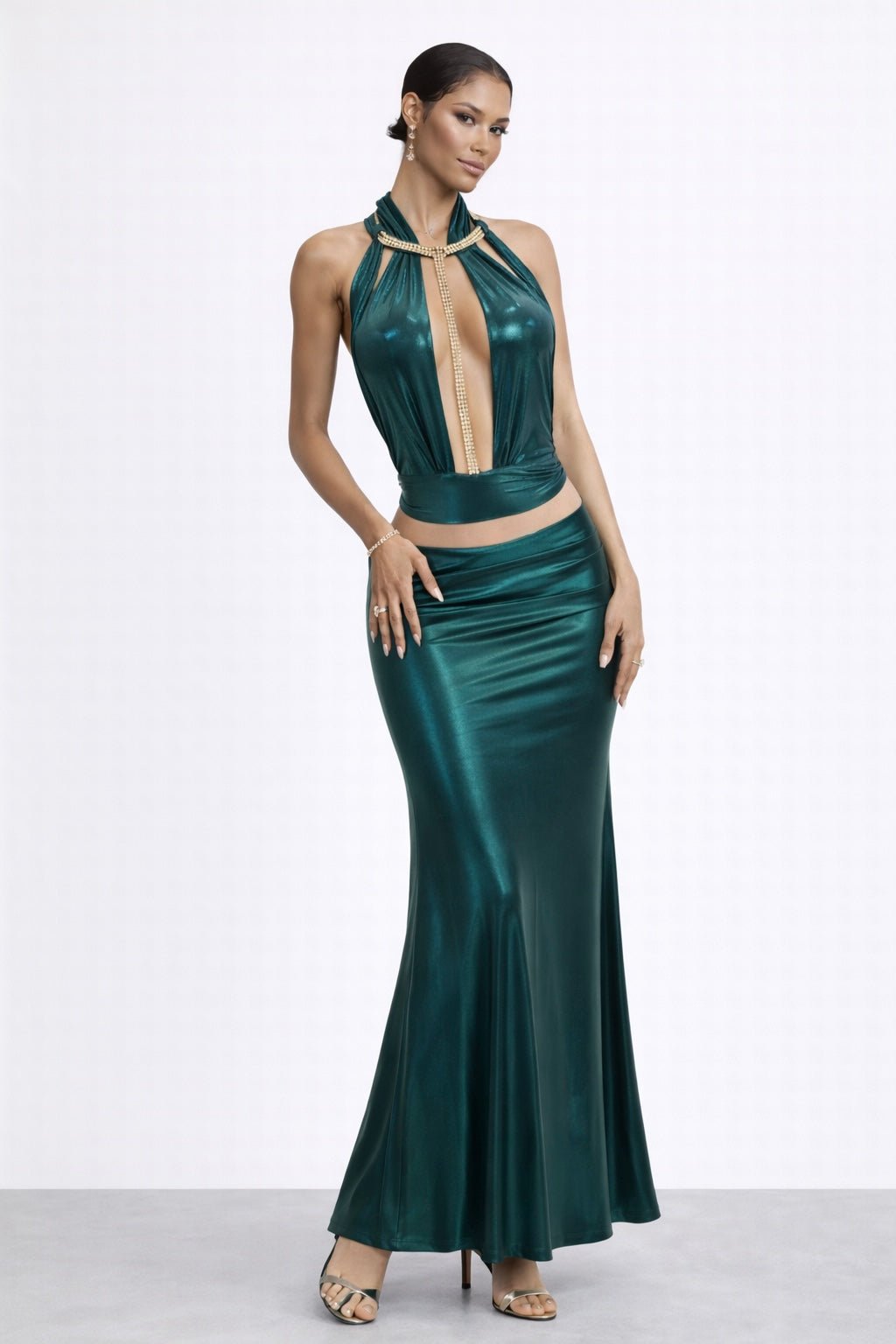 Alt-Text Suggestions



Front view of Katia Top showing crystal halter collar and vertical crystal trim.