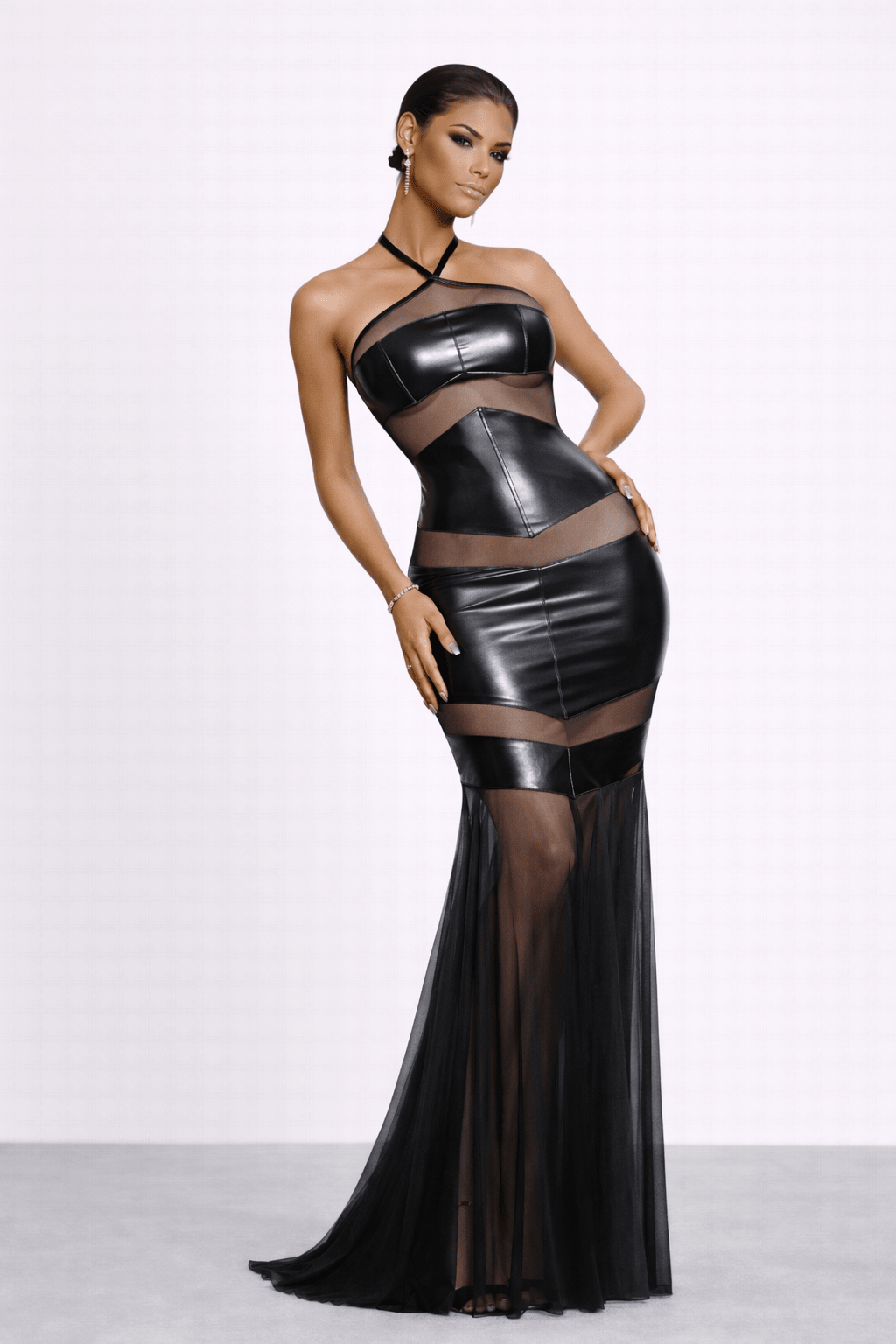 Front view of Kylie Gown showing strapless bodice with mesh cutouts and Mesh fishtail.