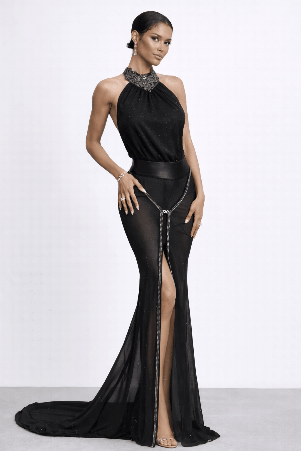 Front view of Marissa Black Label gown showing beaded collar, leather waist, and sheer slit skirt.