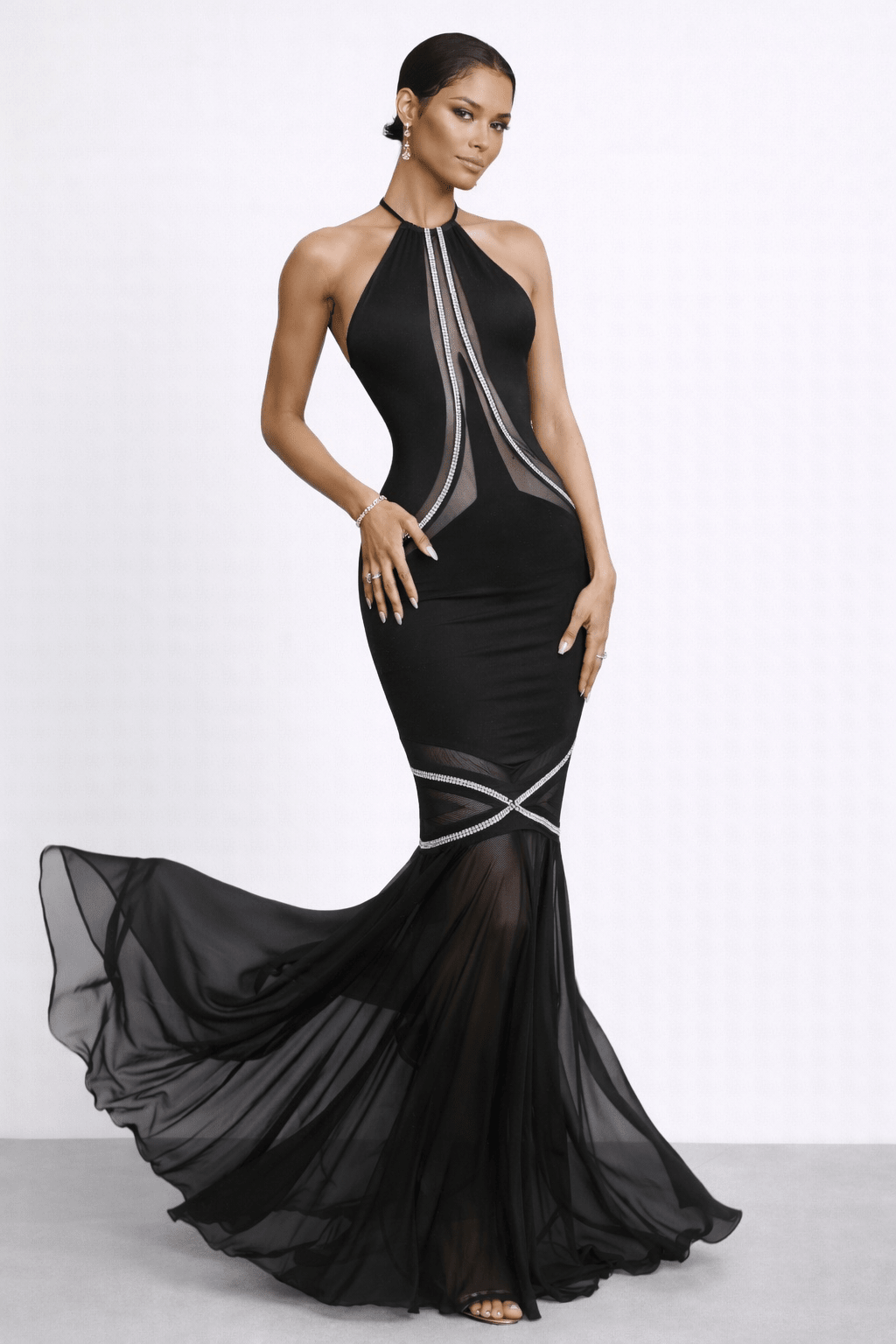 Side angle highlighting chiffon fishtail with crystal cross-belt.